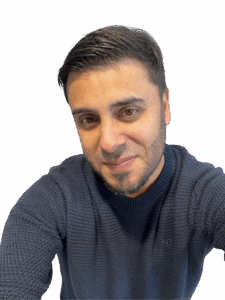 A person wearing a dark blue textured sweater.
