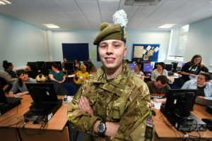 Army team member in an office