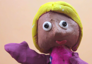 Image of the plasticine model made of Lucy Smith for the animated video