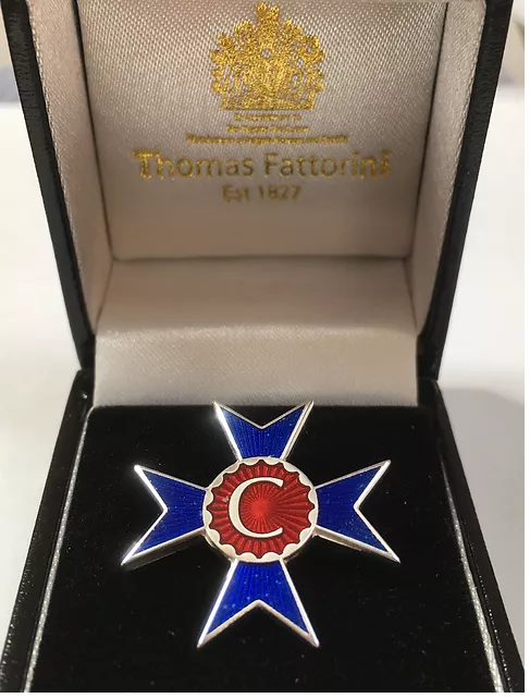 A picture of the Covid Star medal in its presentation box.