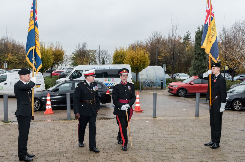 Deputy Lieutenant Michael Fox arriving at the Becklin Centre accompanied by our flag bearers.