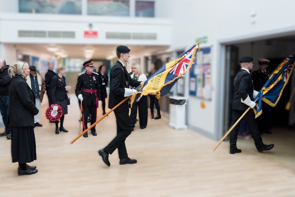 Our flag bearers parading into the service
