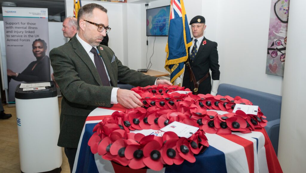 David Rowley, Head of Operations for our Regional and Specialist Services laying a wreath.