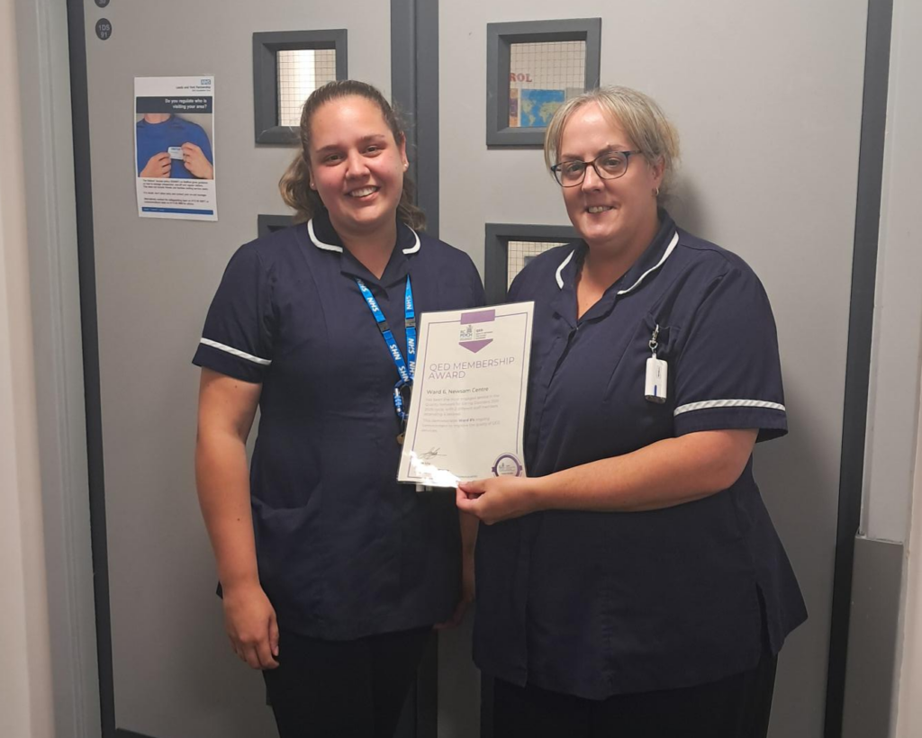 Staff from Ward 6 at the Newsam Centre holding their accreditation certificate. 