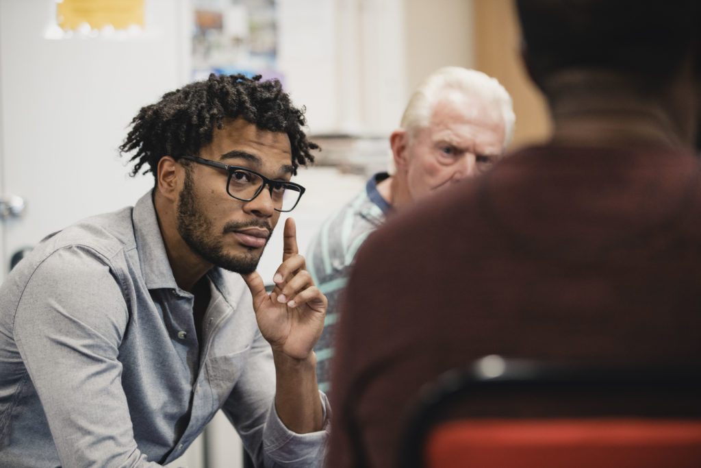 Men Listening in a Support Group