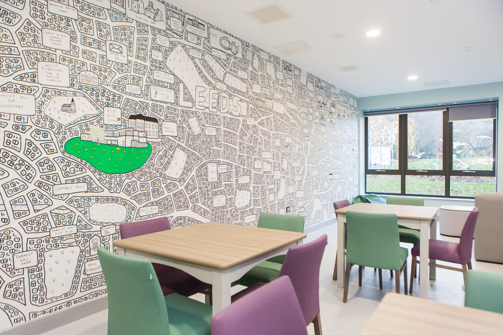 Dining room at Red Kite View with map wall art