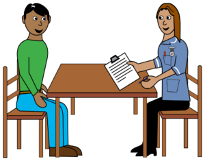 Cartoon-style illustration of a nurse sitting at a table with a person. The nurse is holding a clipboard and pen, appearing to carry out an assessment or discussion. Both are seated on wooden chairs facing each other across the table.