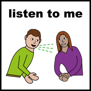Two people sitting facing each other. One person is speaking and the other person is listening.