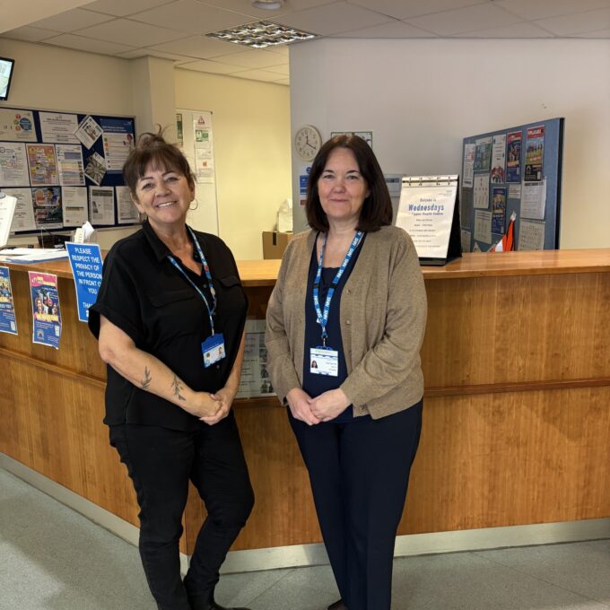 Two receptionist staff at the Kippax health centre.